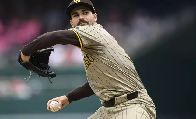 San Diego Padres starting pitcher Dylan Cease winds up to throw during the inning of a baseball game against the Washington Nationals, Thursday, July 25, 2024, in Washington. (AP Photo/John McDonnell)