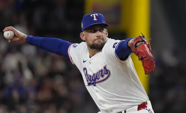Texas Rangers starting pitcher Nathan Eovaldi throws during the first inning of a baseball game against the San Diego Padres in Arlington, Texas, Tuesday, July 2, 2024. (AP Photo/LM Otero)