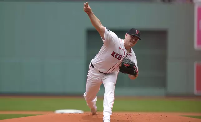 Boston Red Sox' Josh Winckowski delivers a pitch to a San Diego Padres batter in the first inning of a baseball game, Sunday, June 30, 2024, in Boston. (AP Photo/Steven Senne)
