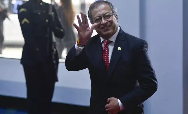 Colombian President Gustavo Petro waves to the press as he arrives at the swearing-in ceremony of Panama's President-elect Jose Raul Mulino at the Atlapa Convention Centre in Panama City, Monday, July 1, 2024. (AP Photo/Agustin Herrera)