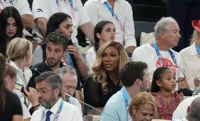 Serena Williams is seen in the stands before the women's artistic gymnastics team finals round at Bercy Arena at the 2024 Summer Olympics, Tuesday, July 30, 2024, in Paris, France. (AP Photo/Natacha Pisarenko)