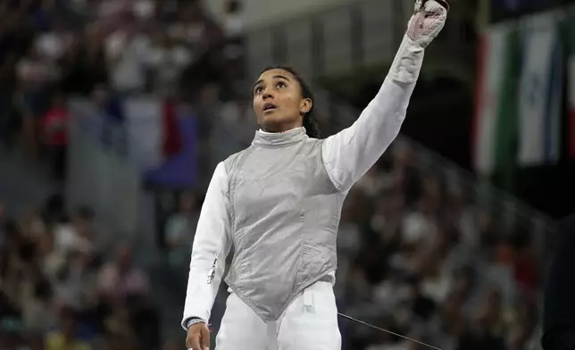 United States' Lauren Scruggs reacts after winning the women's individual Foil semifinal match against Canada's Eleanor Harvey during the 2024 Summer Olympics at the Grand Palais, Sunday, July 28, 2024, in Paris, France. (AP Photo/Andrew Medichini)