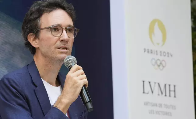 Antoine Arnault, of the French luxury group LVMH, speaks at an event to open the LVMH Pavilion, showcasing creations of the luxury brand related to the Paris 2024 Summer Olympics, Monday, July 22, 2024, in Paris. (AP Photo/Rebecca Blackwell)