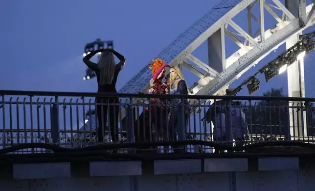 Drag queen Piche prepares to perform, at the Debilly Bridge in Paris, during the opening ceremony of the 2024 Summer Olympics, Friday, July 26, 2024. (AP Photo/Tsvangirayi Mukwazhi)