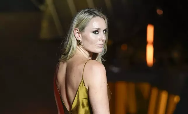 Lindsey Vonn upon arrival at the Louis Vuitton Foundation on the eve of Paris Olympics opening ceremony, at the 2024 Summer Olympics, Thursday, July 25, 2024, in Paris, France. (AP Photo/Rebecca Blackwell)