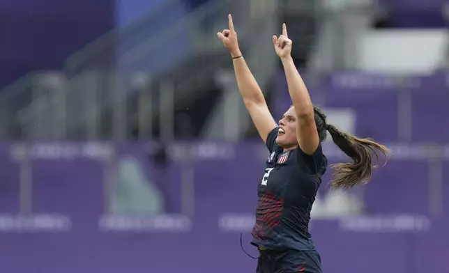 United States' Ilona Maher celebrates after her team won the women's bronze medal Rugby Sevens match between the United States and Australia at the 2024 Summer Olympics, in the Stade de France, in Saint-Denis, France, Tuesday, July 30, 2024. (AP Photo/Vadim Ghirda)