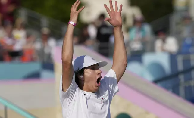 Jagger Eaton, of the United States, reacts after landing a trick during the men's skateboard street final at the 2024 Summer Olympics, Monday, July 29, 2024, in Paris, France. (AP Photo/Dar Yasin)