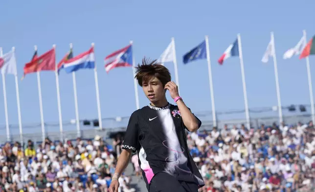 Yuto Horigome, of Japan, reacts during the men's skateboard street final at the 2024 Summer Olympics, Monday, July 29, 2024, in Paris, France. (AP Photo/Dar Yasin)