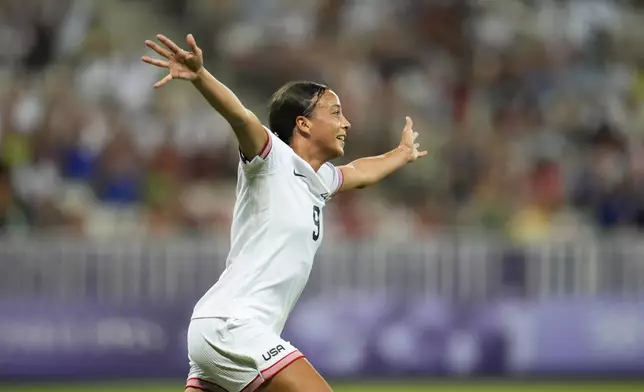 United States' Mallory Swanson reacts after scoring her side's second goal during a women's group B match between the United States and Zambia at Nice Stadium at the 2024 Summer Olympics, Thursday, July 25, 2024, in Nice, France. (AP Photo/Julio Cortez)