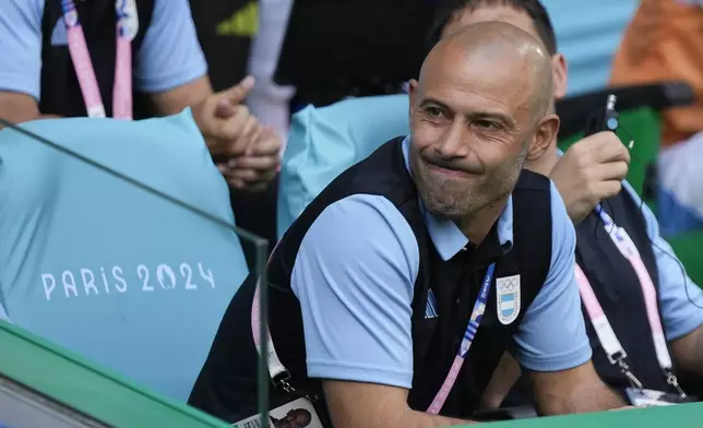 Argentina's coach Javier Mascherano gestures prior to the men's Group B soccer match between Argentina and Morocco at Geoffroy-Guichard Stadium at the 2024 Summer Olympics, Wednesday, July 24, 2024, in Saint-Etienne, France. (AP Photo/Silvia Izquierdo)