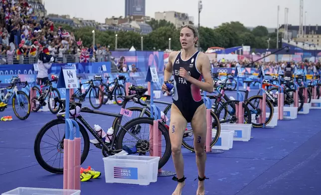 France's Cassandre Beaugrand competes during the women's individual triathlon competition at the 2024 Summer Olympics, Wednesday, July 31, 2024, in Paris, France. (AP Photo/Dar Yasin)