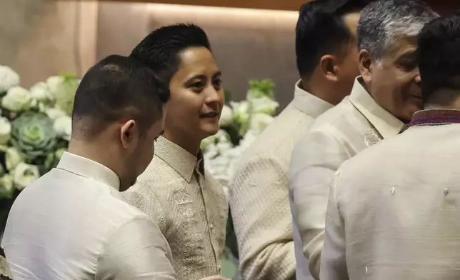 Congressman Sandro Marcos, son of President Marcos, arrives at the plenary hall ahead of the State of the Nation Address at the House of Representatives in Quezon City, Philippines, on Monday, July 22, 2024. (AP Photo/ Gerard V. Carreon)