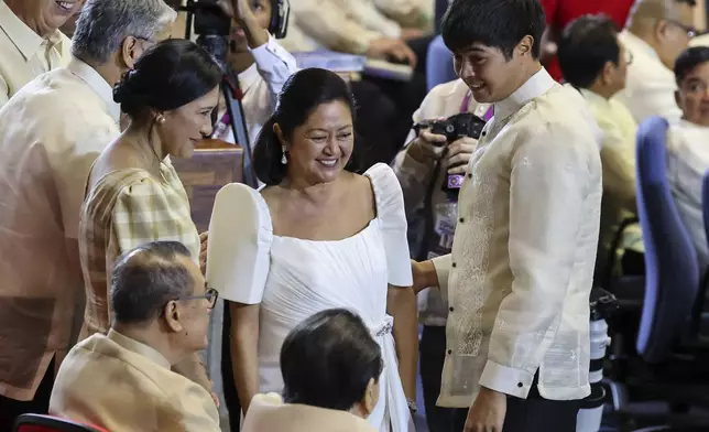 First Lady Marie Louise Marcos arrives at the plenary hall ahead of the State of the Nation Address at the House of Representatives in Quezon City, Philippines, on Monday, July 22, 2024. (AP Photo/ Gerard V. Carreon)