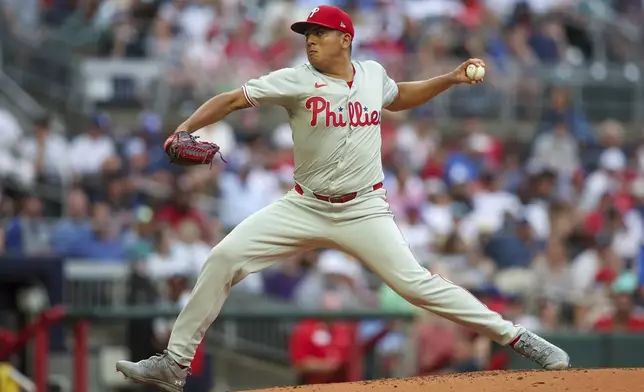 Philadelphia Phillies starting pitcher Ranger Suarez delivers in the first inning of a baseball game against the Atlanta Braves, Saturday, July 6, 2024, in Atlanta. (AP Photo/Brett Davis)