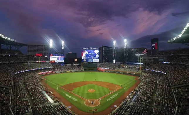 Truist Park is viewed during the fifth inning of a baseball game between the Atlanta Braves and the Philadelphia Phillies, Saturday, July 6, 2024, in Atlanta. (AP Photo/Brett Davis)