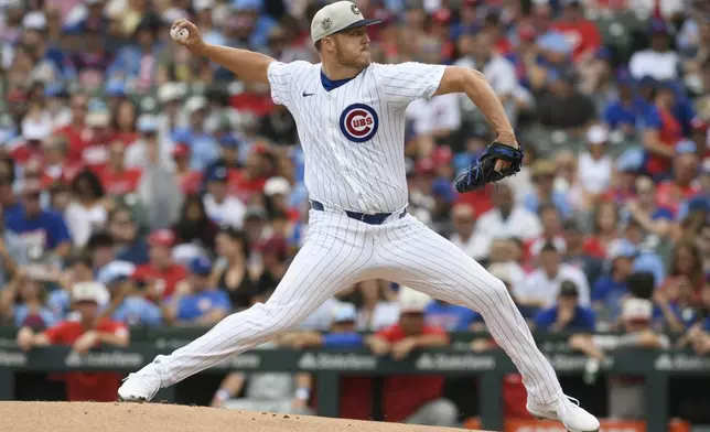 Chicago Cubs starter Jameson Taillon delivers a pitch during the first inning of a baseball game against the Philadelphia Phillies Thursday, July 4, 2024, in Chicago. (AP Photo/Paul Beaty)