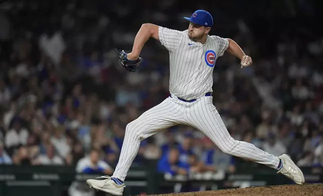 Chicago Cubs' pitcher Luke Little throws against the Philadelphia Phillies during the ninth inning of a baseball game Wednesday, July 3, 2024, in Chicago. (AP Photo/Erin Hooley)
