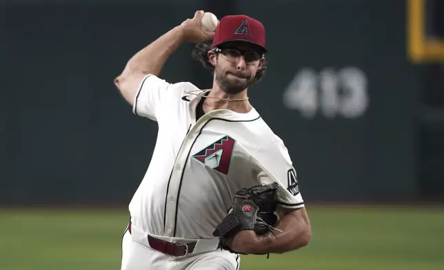 Arizona Diamondbacks pitcher Zac Gallen throws against the Pittsburgh Pirates in the first inning during a baseball game, Friday, July 26, 2024, in Phoenix. (AP Photo/Rick Scuteri)