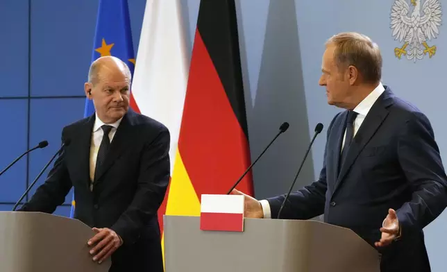 German Chancellor Olaf Scholz, left, and Polish Prime Minister Donald Tusk attend a press conference after German-Polish inter-governmental consultations in Warsaw, Poland, Tuesday, July 2, 2024. (AP Photo/Czarek Sokolowski)