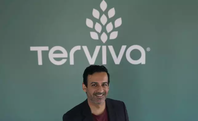 Naveen Sikka, founder and CEO of Terviva, poses for a portrait at the company's headquarters in Alameda, Calif., Thursday, May 9, 2024. Founded in 2010, the company works with farmers to grow pongamia trees, which are climate resilient and produce a high-protein legume. (AP Photo/Jeff Chiu)