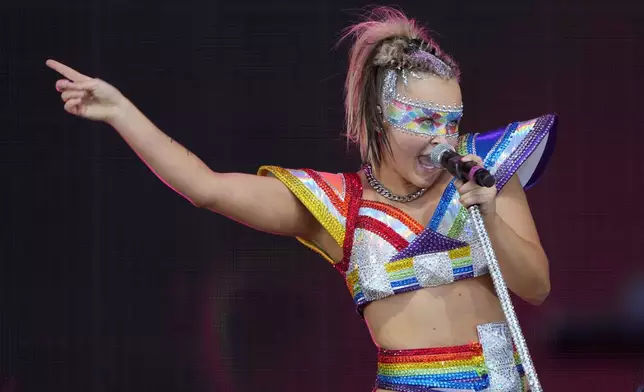 JoJo Siwa performs during the LA Pride in the Park festival at Los Angeles State Historic Park, Saturday, June 8, 2024, in Los Angeles. (AP Photo/Chris Pizzello)