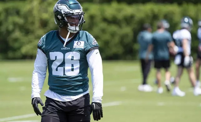 FILE - Philadelphia Eagles running back Saquon Barkley in action during the practice at NFL football minicamp, Tuesday, June 4, 2024, in Philadelphia. The Jets' Aaron Rodgers, Pittsburgh’s Russell Wilson, San Francisco’s Christian McCaffrey, Jacksonville’s Trevor Lawrence and Philadelphia’s Saquon Barkley are players who are out to prove themselves this season either because of injuries, mediocre play or needing to justify big contracts. (AP Photo/Chris Szagola, File)