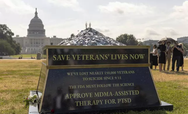 In this photo provided by the Heroic Hearts Project, a memorial paying tribute to the estimated 150,000 veterans who have lost their lives to suicide over the past 20 years is displayed near the U.S. Capitol in Washington on July 10, 2024. (Michael Schoen/Heroic Hearts Project via AP)