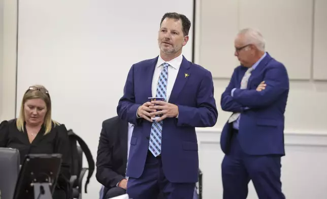 Brian Auld, co-president of the Tampa Bay Rays, attends a meeting of the Pinellas County commissioners on Tuesday, July 30, 2024, in Clearwater, Fla., where they voted for funding for a new Tampa Bay Rays ballpark. (Douglas R. Clifford/Tampa Bay Times via AP)