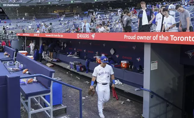 Toronto Blue Jays' Daulton Varsho leaves the dugout after his team's loss to the Tampa Bay Rays in baseball game action in Toronto, Thursday, July 25, 2024. (Chris Young/The Canadian Press via AP)