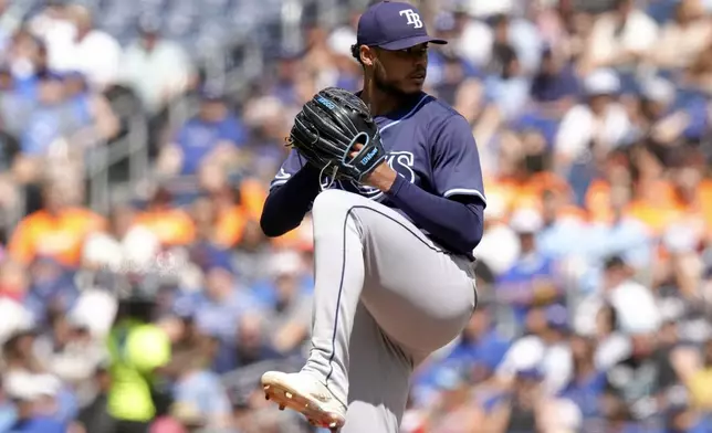 Tampa Bay Rays pitcher Taj Bradley works against Toronto Blue Jays during first inning American League MLB baseball action in Toronto on Thursday, July 25, 2024. (Chris Young/The Canadian Press via AP)