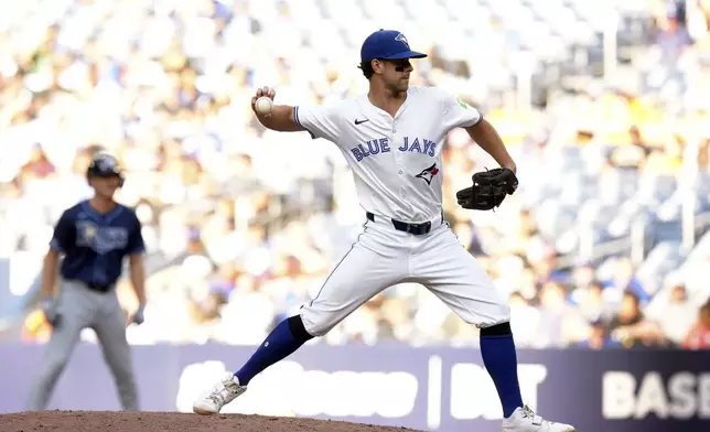 Toronto Blue Jays third baseman Ernie Clement takes over pitching duties against the Tampa Bay Rays during ninth inning American League MLB baseball action in Toronto on Thursday, July 25, 2024. THE CANADIAN PRESS/Chris Young/The Canadian Press via AP)