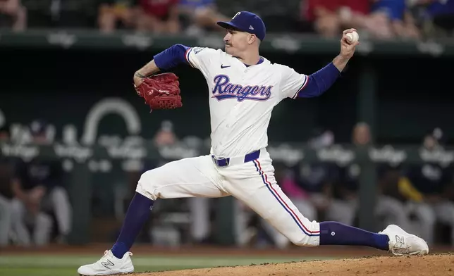 Texas Rangers starting pitcher Andrew Heaney throws to the Tampa Bay Rays in the third inning of a baseball game in Arlington, Texas, Saturday, July 6, 2024. (AP Photo/Tony Gutierrez)