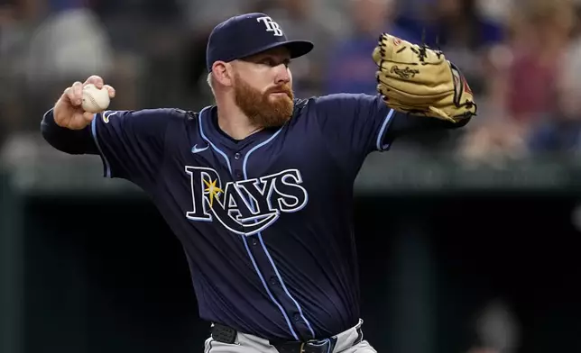 Tampa Bay Rays starting pitcher Zack Littell throws to the Texas Rangers in the fourth inning of a baseball game in Arlington, Texas, Sunday, July 7, 2024. (AP Photo/Tony Gutierrez)