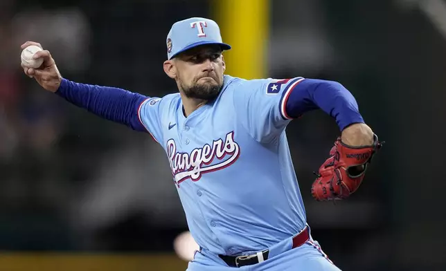 Texas Rangers starting pitcher Nathan Eovaldi throws to the Tampa Bay Rays in the first inning of a baseball game in Arlington, Texas, Sunday, July 7, 2024. (AP Photo/Tony Gutierrez)