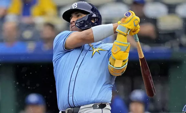 Tampa Bay Rays' Isaac Paredes hits a solo home run during the first inning of a baseball game against the Kansas City Royals Wednesday, July 3, 2024, in Kansas City, Mo. (AP Photo/Charlie Riedel)