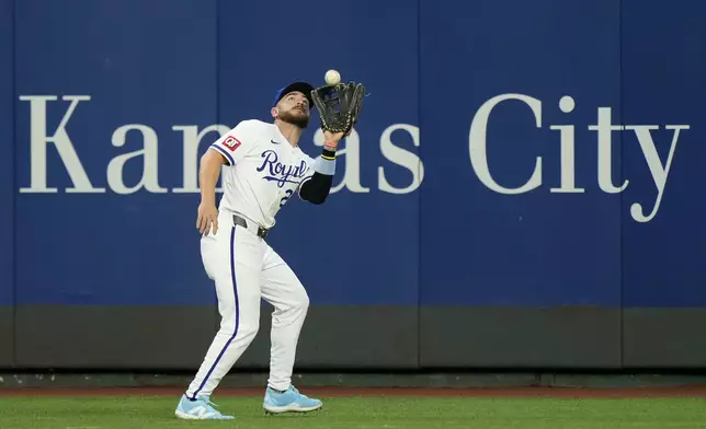 Kansas City Royals center fielder Garrett Hampson catches a fly ball for the out on Tampa Bay Rays' Ben Rortvedt during the fourth inning of a baseball game Tuesday, July 2, 2024, in Kansas City, Mo. (AP Photo/Charlie Riedel)