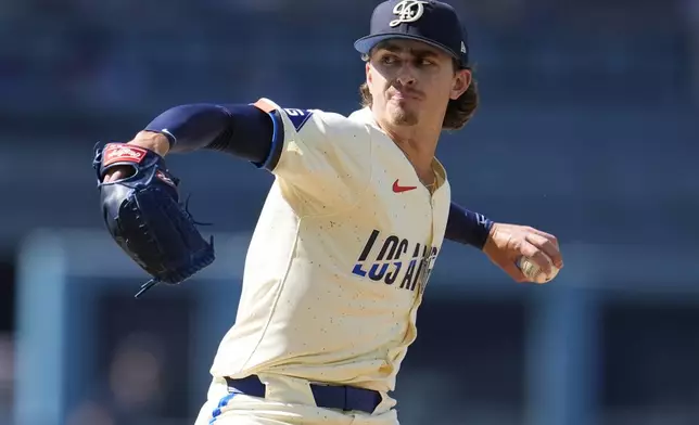 Los Angeles Dodgers starting pitcher Justin Wrobleski throws to a Boston Red Sox batter during the first inning of a baseball game Saturday, July 20, 2024, in Los Angeles. (AP Photo/Marcio Jose Sanchez)