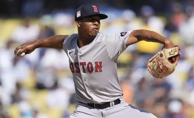 Boston Red Sox pitcher Brayan Bello throws to a Los Angeles Dodgers batter during the first inning of a baseball game Saturday, July 20, 2024, in Los Angeles. (AP Photo/Marcio Jose Sanchez)