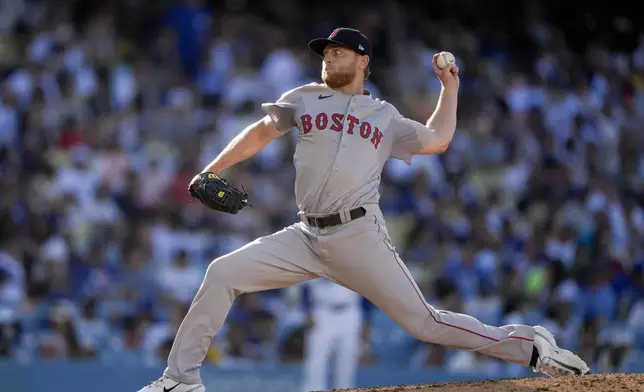 Boston Red Sox relief pitcher Zack Kelly throws during the sixth inning of a baseball game against the Los Angeles Dodgers, Sunday, July 21, 2024, in Los Angeles. (AP Photo/Ryan Sun)