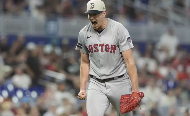 Boston Red Sox starting pitcher Nick Pivetta reacts after allowing one hit in seven inning of a baseball game against the Miami Marlins, Thursday, July 4, 2024, in Miami. (AP Photo/Marta Lavandier)