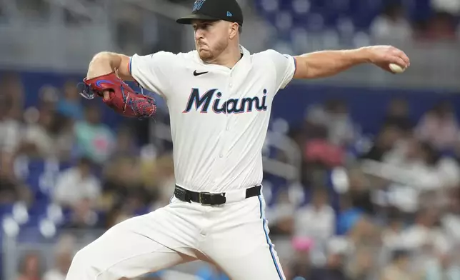 Miami Marlins starting pitcher Trevor Rogers aims a pitch during the first inning of a baseball game against the Boston Red Sox, Wednesday, July 3, 2024, in Miami. (AP Photo/Marta Lavandier)