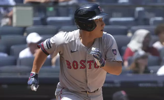 Boston Red Sox' Masataka Yoshida runs to first base for an RBI single during the third inning of a baseball game against the New York Yankees, Saturday, July 6, 2024, in New York. (AP Photo/Pamela Smith)