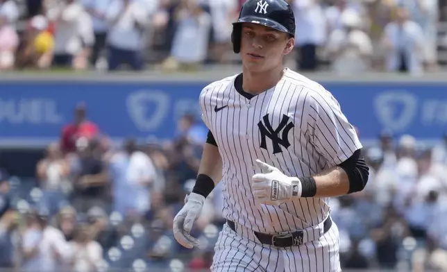 New York Yankees' Ben Rice runs the basses after hitting a home run during the first inning of a baseball game against the Boston Red Sox, Saturday, July 6, 2024, in New York. (AP Photo/Pamela Smith)