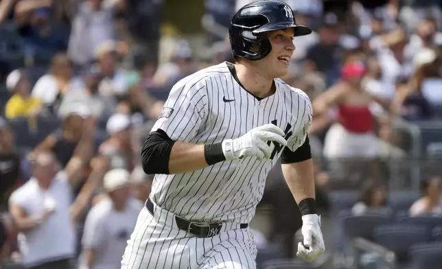 New York Yankees' Ben Rice runs to first base after hitting a home run during the seventh inning of a baseball game against the Boston Red Sox, Saturday, July 6, 2024, in New York. (AP Photo/Pamela Smith)