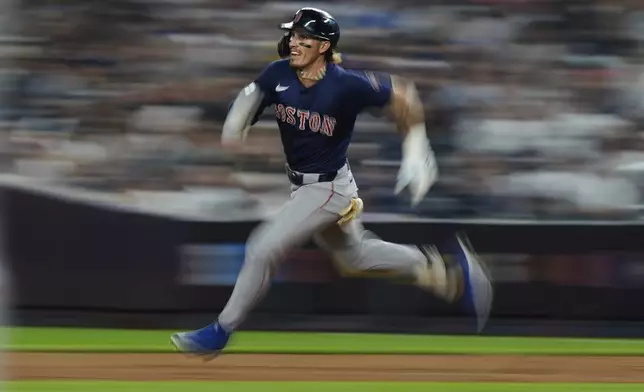 Boston Red Sox's Jarren Duran runs to second base for a double during the 10th inning of a baseball game against the New York Yankees, Friday, July 5, 2024, in New York. (AP Photo/Frank Franklin II)