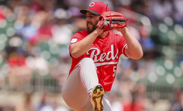 Cincinnati Reds pitcher Sam Moll pitches in the fifth inning of the first baseball game of a doubleheader against the Atlanta Braves, Wednesday, July 24, 2024, in Atlanta. (AP Photo/Jason Allen)