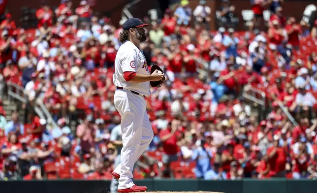 St. Louis Cardinals starting pitcher Lance Lynn pauses on the mound during the first inning of a baseball game against the Cincinnati Reds, Sunday, June 30, 2024, in St. Louis. (AP Photo/Scott Kane)