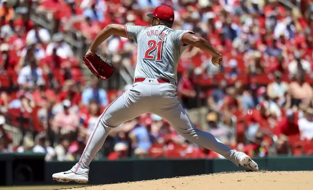 Cincinnati Reds starting pitcher Hunter Greene throws during the first inning of a baseball game against the St. Louis Cardinals, Sunday, June 30, 2024, in St. Louis. (AP Photo/Scott Kane)