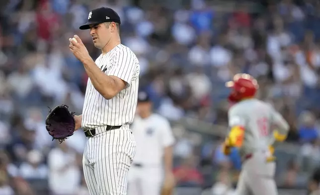 New York Yankees pitcher Carlos Rodón reacts as Cincinnati Reds' Noelvi Marte runs the bases after hitting a two-run home run during the second inning of a baseball game, Wednesday, July 3, 2024, in New York. (AP Photo/Frank Franklin II)
