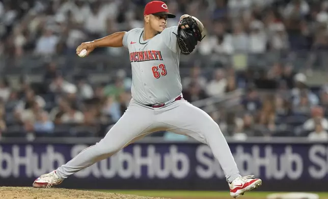 Cincinnati Reds' Fernando Cruz (63) pitches during the seventh inning of a baseball game against the New York Yankees, Wednesday, July 3, 2024, in New York. (AP Photo/Frank Franklin II)